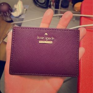 NWOT Kate spade card holder. Color: eggplant